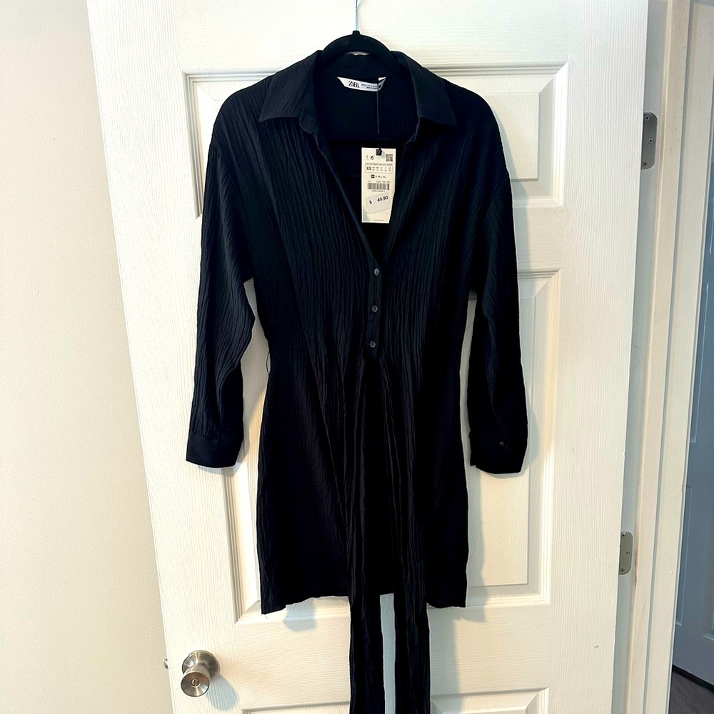 This black Zara dress is a perfect closet staple. The material travels well!